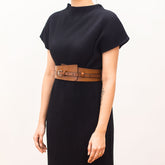 Brown crossbody bag with adjustable strap.